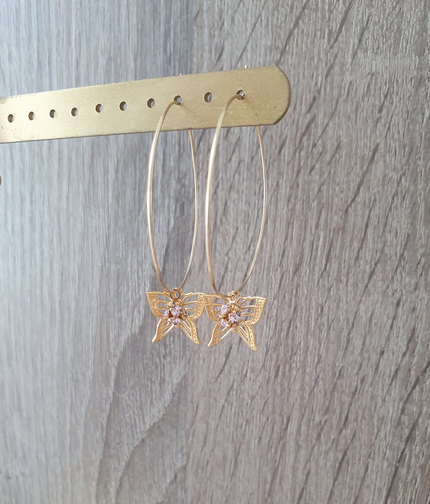 Gold butterfly hoop earrings