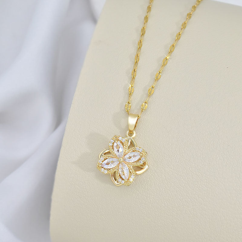 Rotatable Titanium Steel Four-petal Flower Necklace Female Inlaid Zircon Ring Earrings