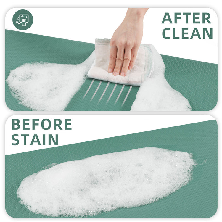 a person wiping a stain