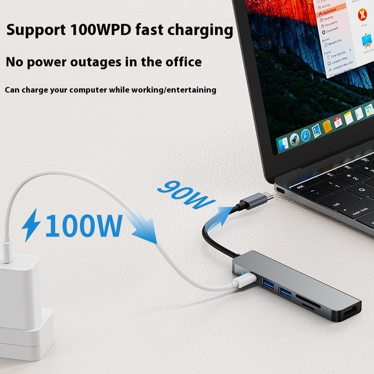 a laptop with a charger attached to it