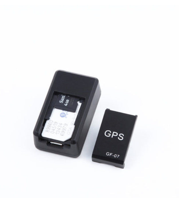 a small black device with a small black object