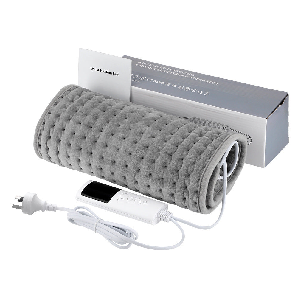 a grey blanket with a box and a phone