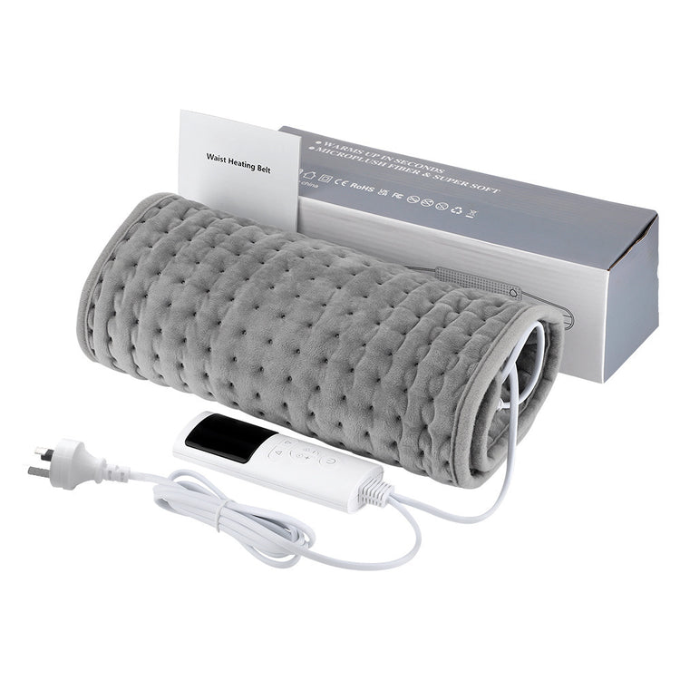 a grey blanket with a box and a phone