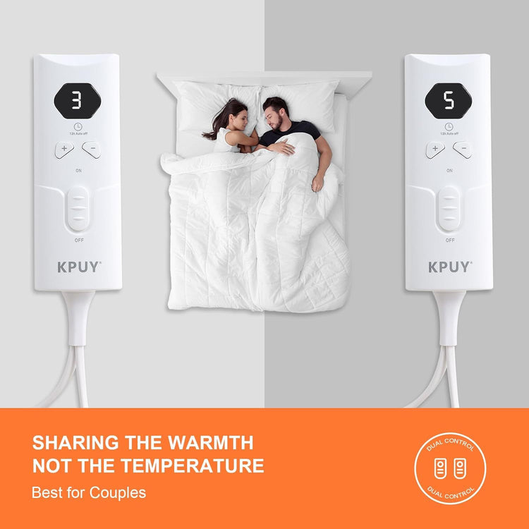 a man and woman lying in bed with a blanket and remotes