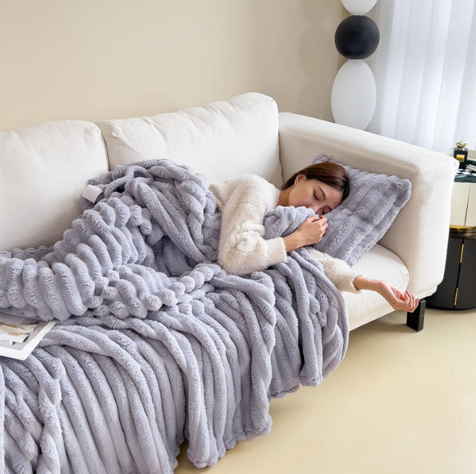 a woman sleeping on a couch