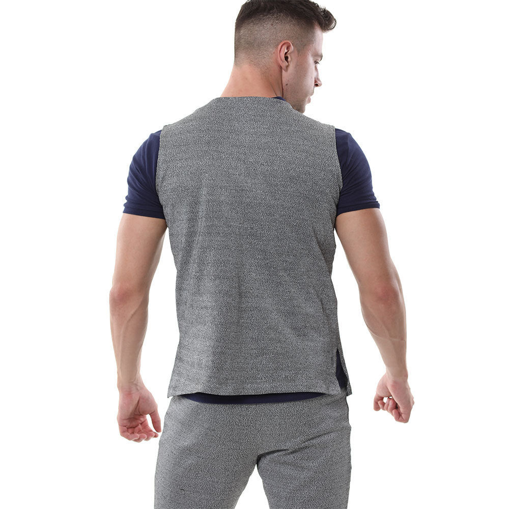 a man in a vest