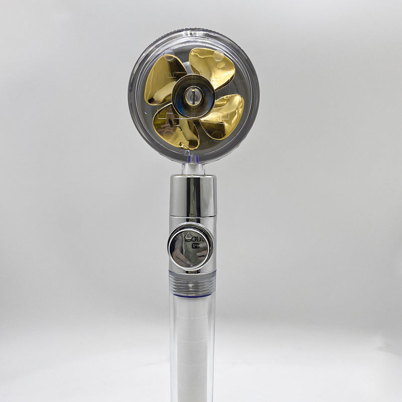 a fan with a gold blade