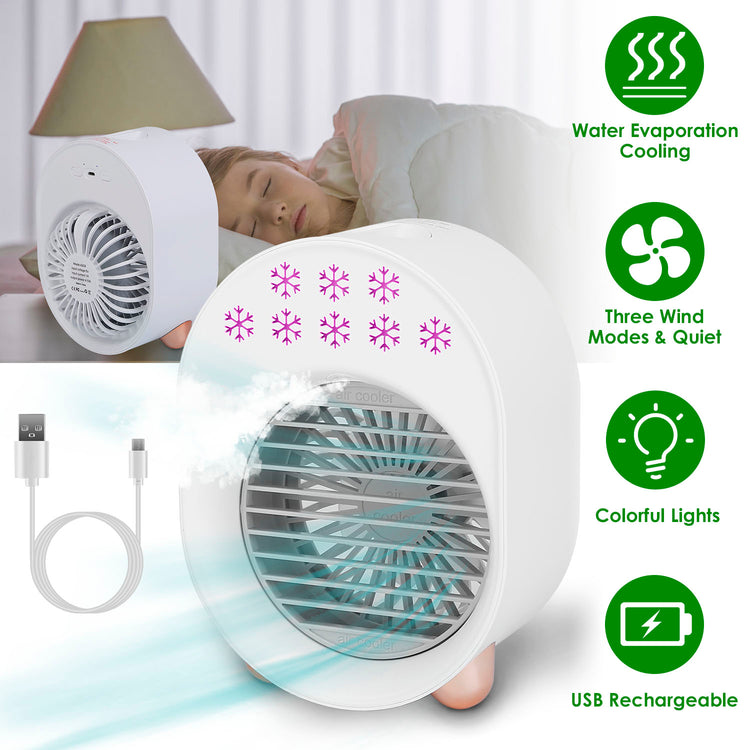a woman sleeping in bed with a fan
