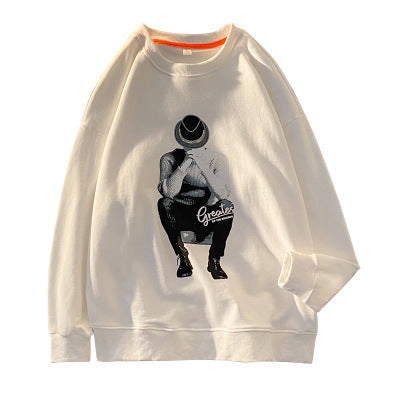 a white sweatshirt with a picture on it