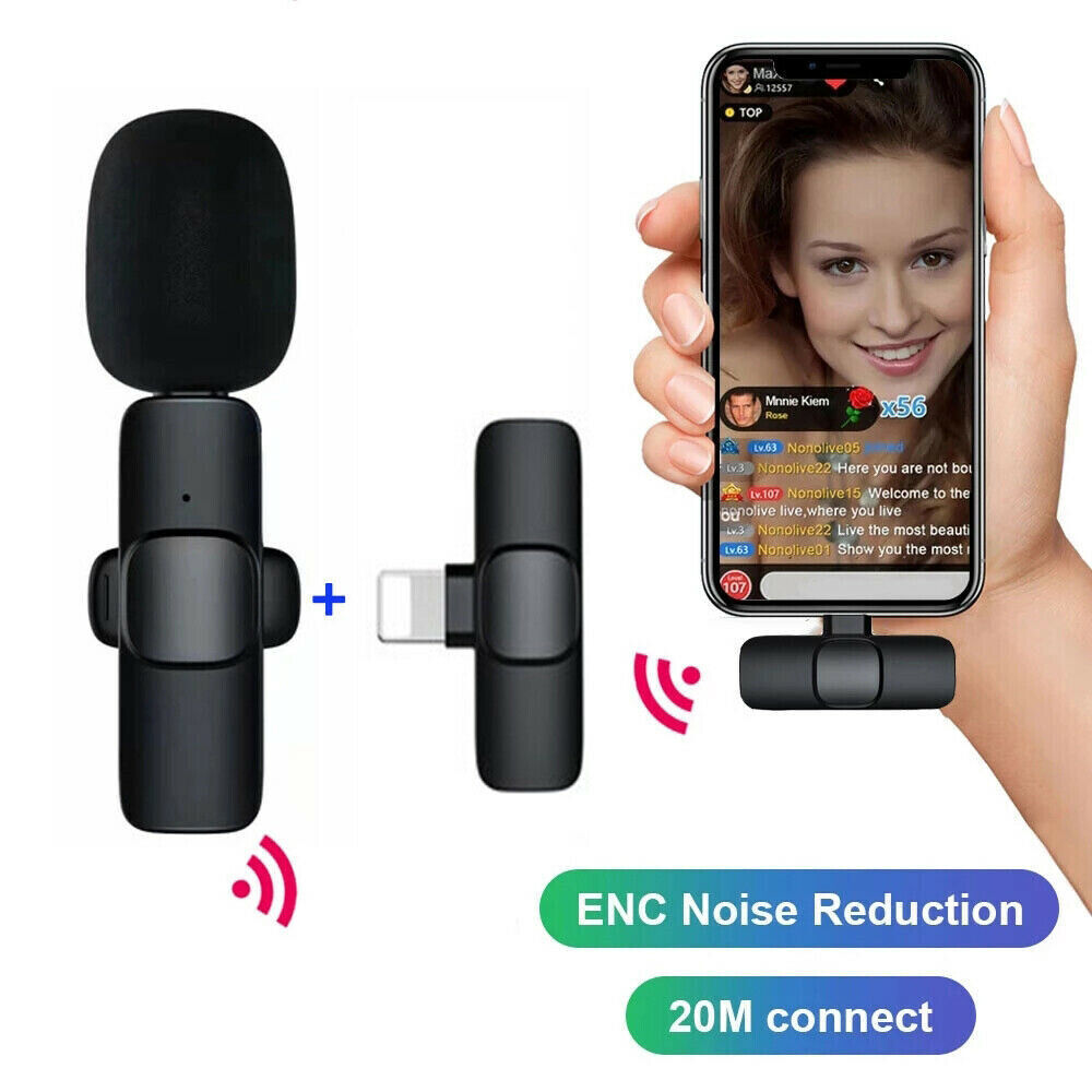 a hand holding a phone and a microphone