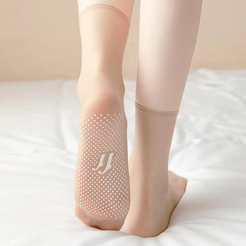 a person's feet with white socks on them