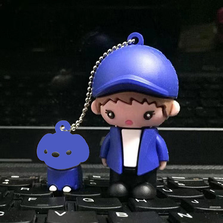 a toy figurine on a keyboard