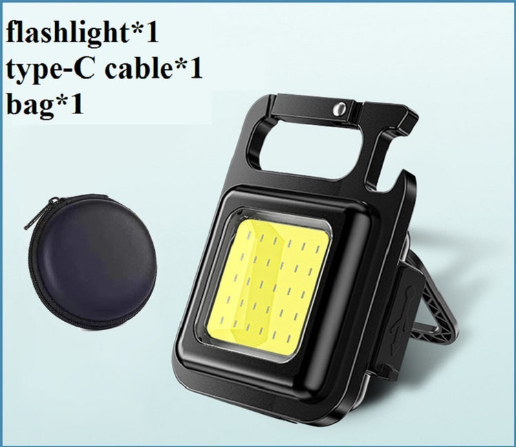 a black and yellow flashlight
