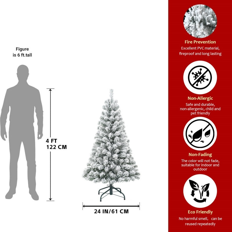 a person standing next to a christmas tree