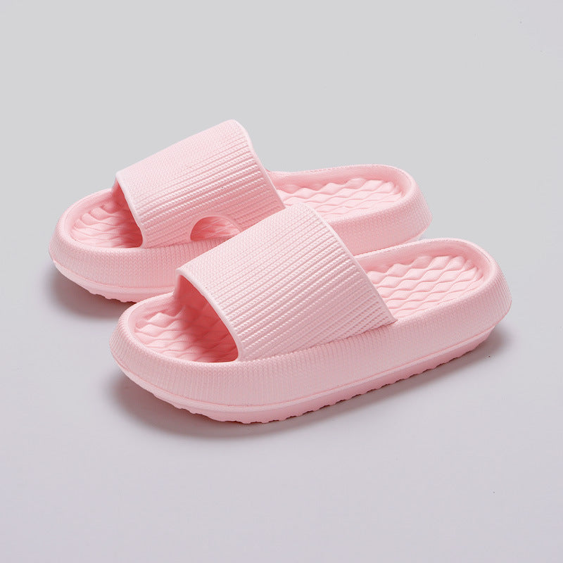 a pair of pink slippers