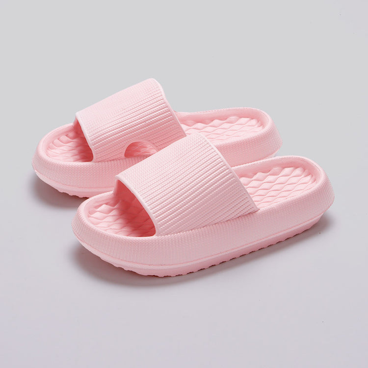 a pair of pink slippers