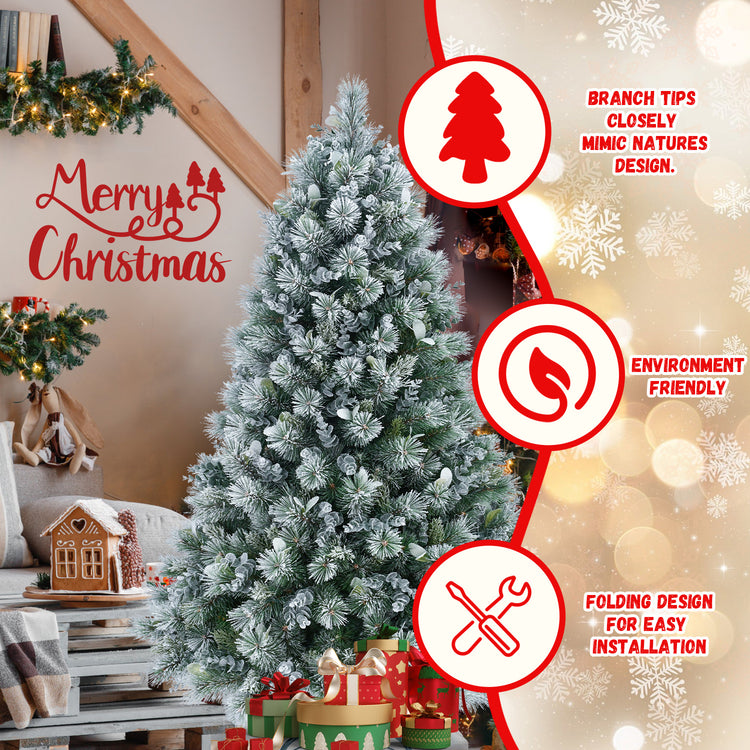 a christmas tree with presents and a couch