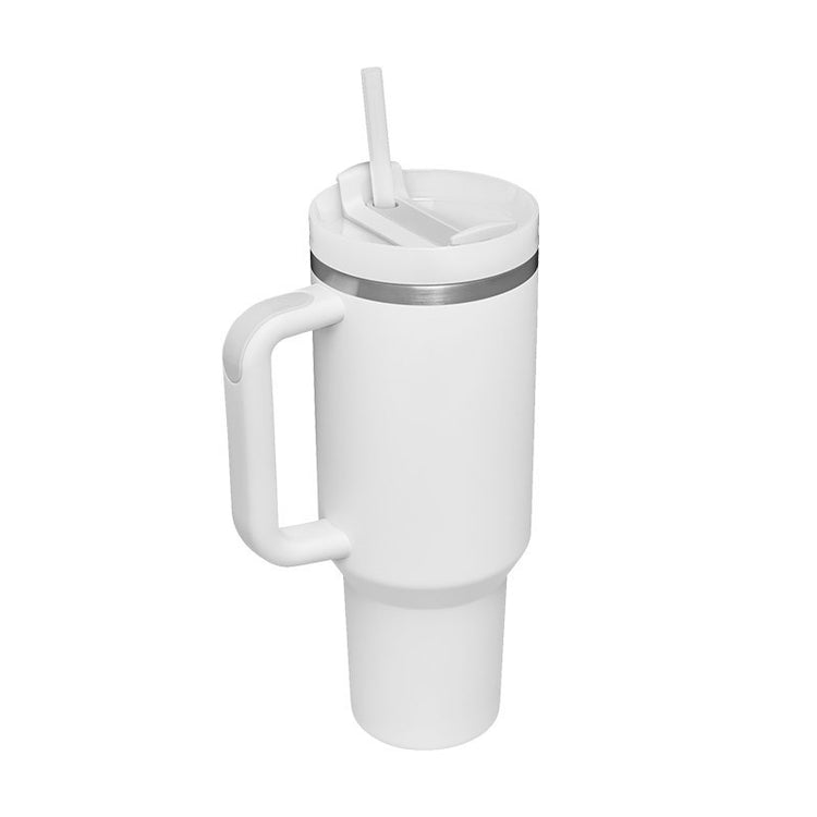 a white coffee mug with a spoon