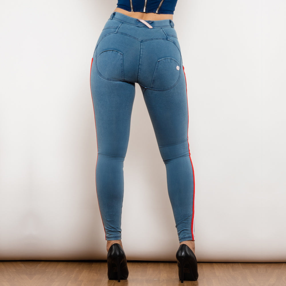 a woman wearing blue jeans