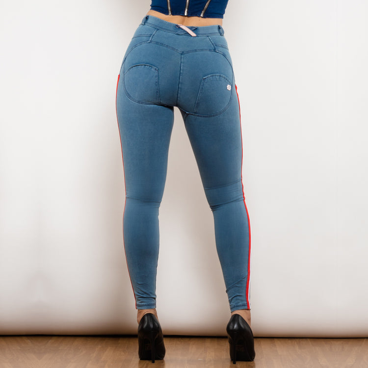 a woman wearing blue jeans