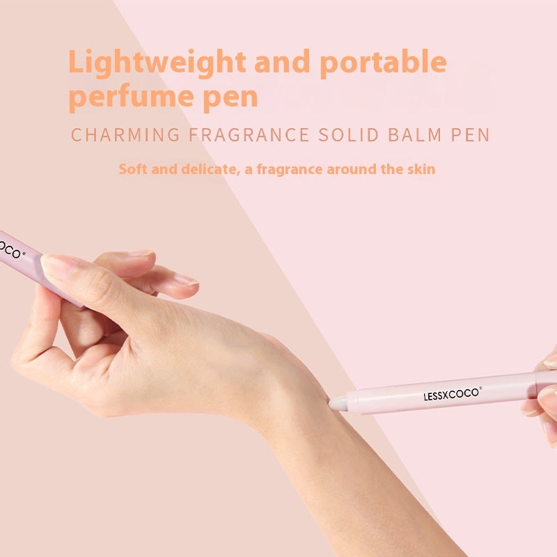 a hand holding a pen