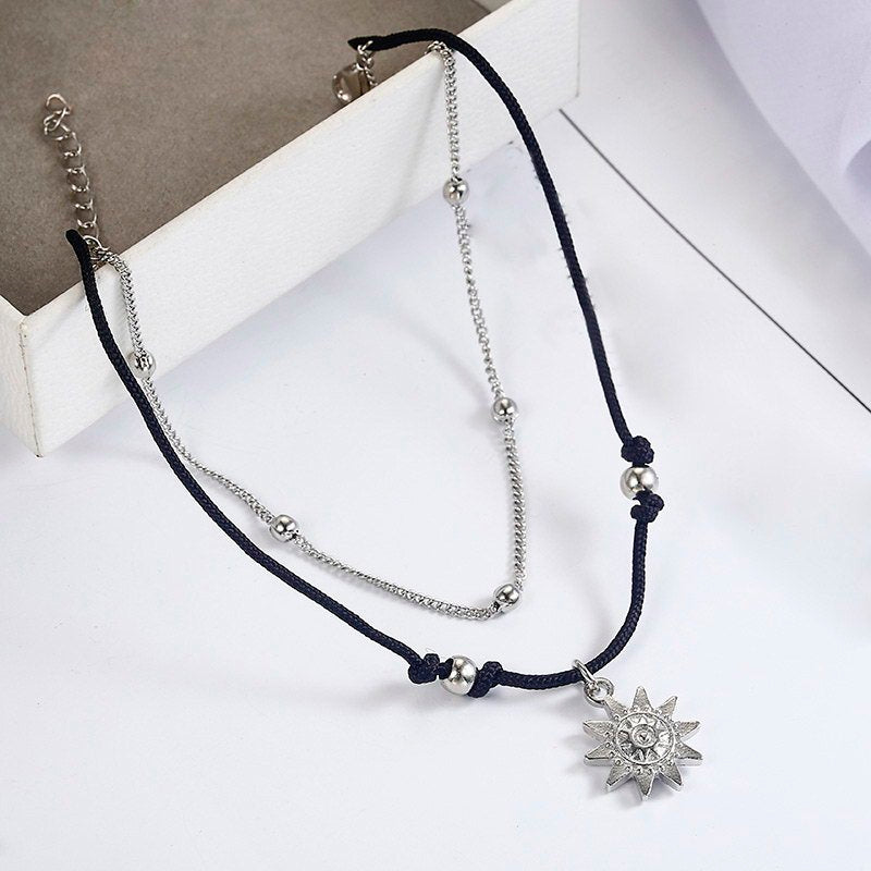 a necklace with a pendant on it
