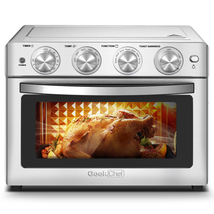 a silver oven with a turkey inside