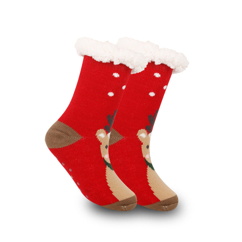 a pair of red socks with a deer design