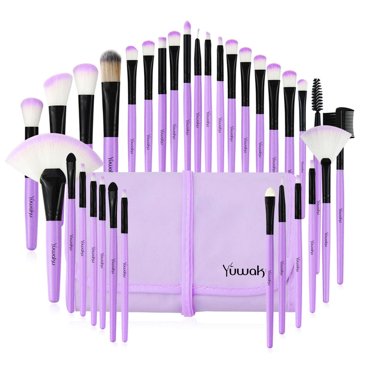 a group of makeup brushes