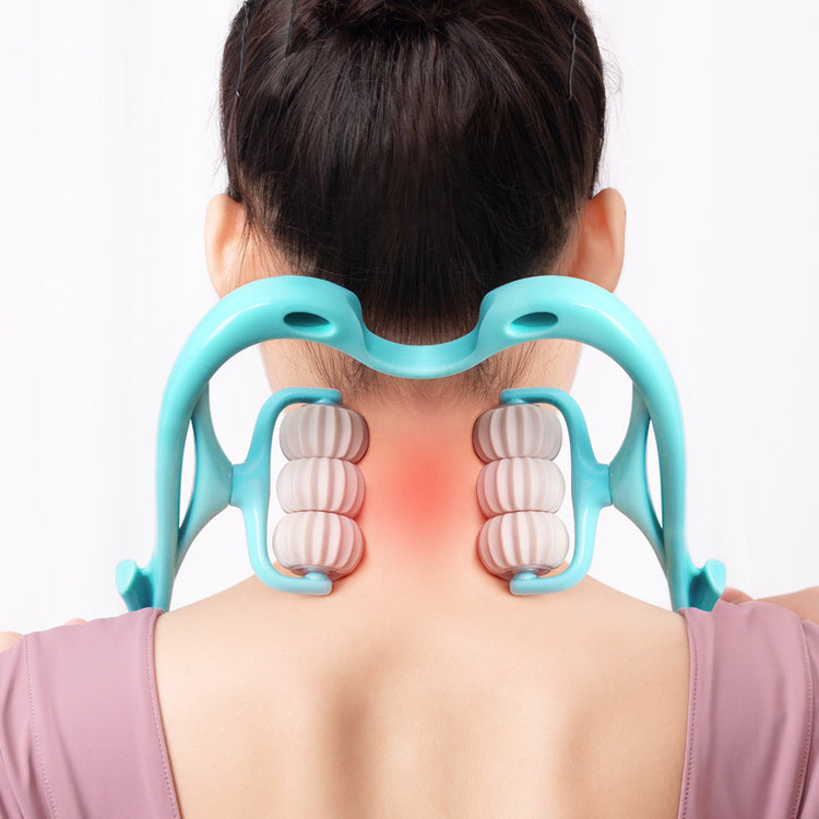 a woman with a massager on her neck