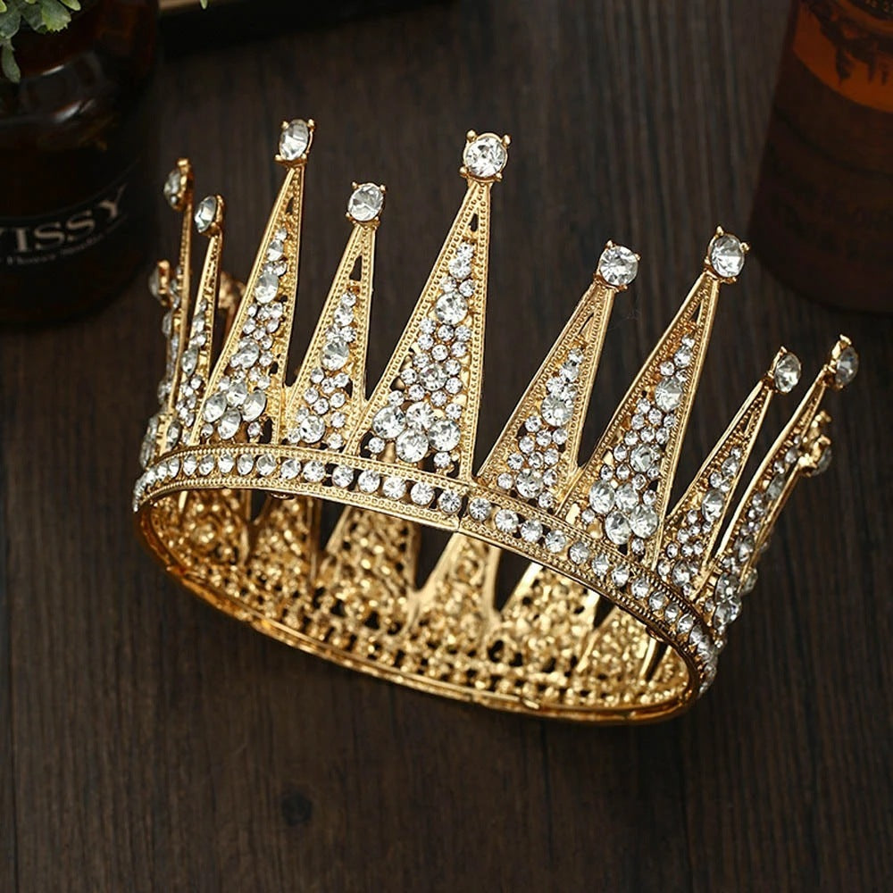 a gold crown with diamonds on a table