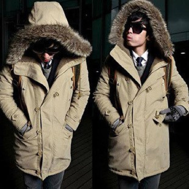 a man wearing a coat with a fur hood