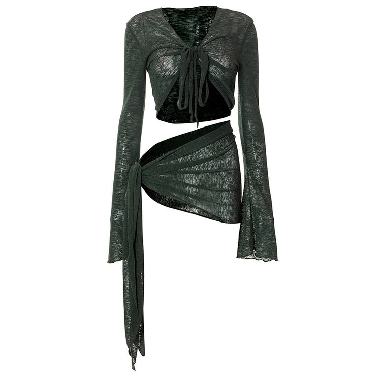 a green top and skirt