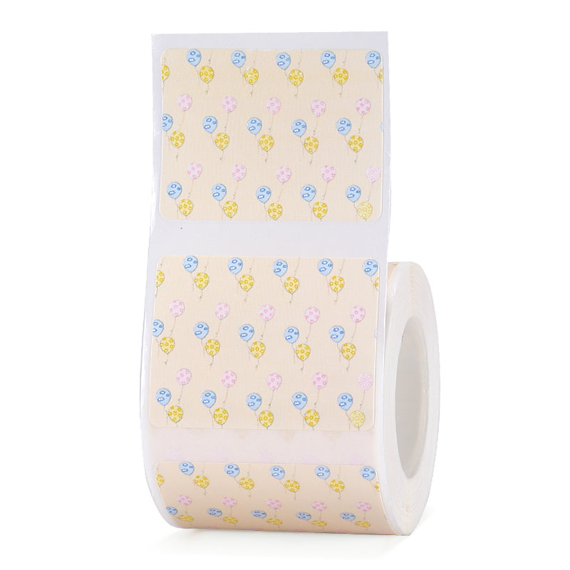 a roll of tape with balloons on it