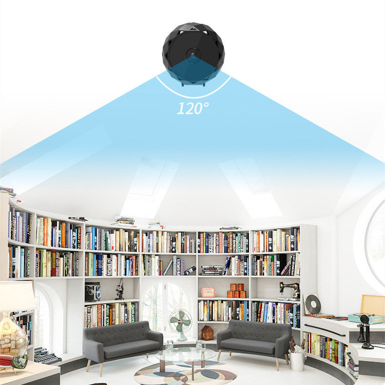 a room with a round ceiling and a round table and bookshelf