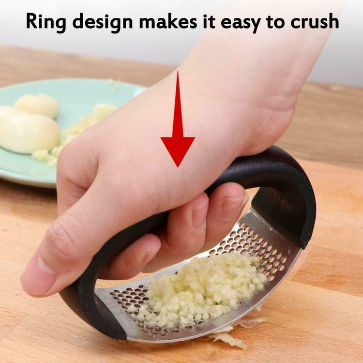 a hand grating garlic