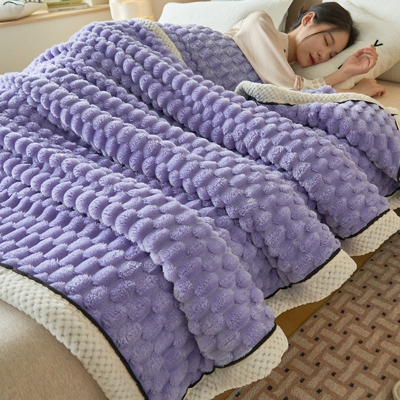 a woman sleeping on a bed