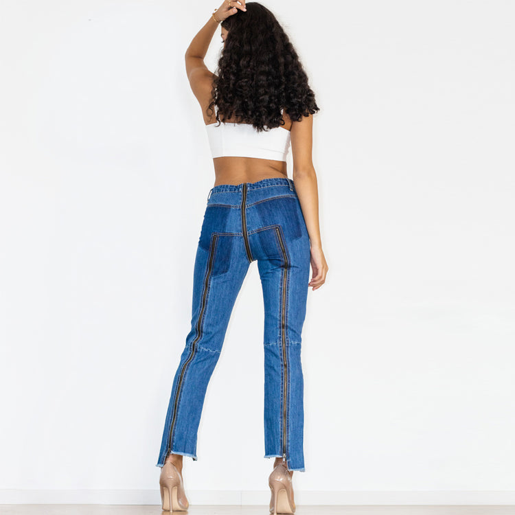 a woman in blue jeans