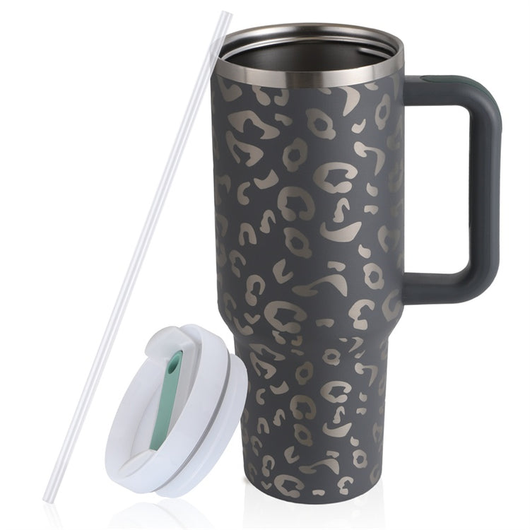 a black and grey coffee mug with a straw and a white lid
