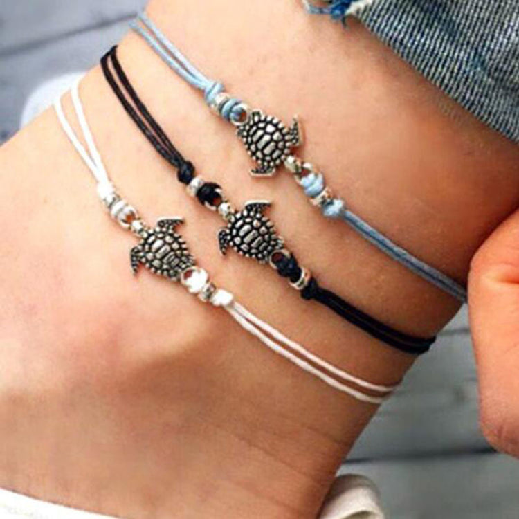 a bracelets on a person's ankle