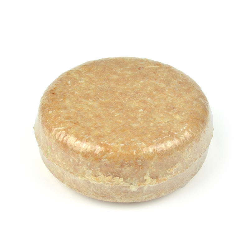 a round brown object with white substance