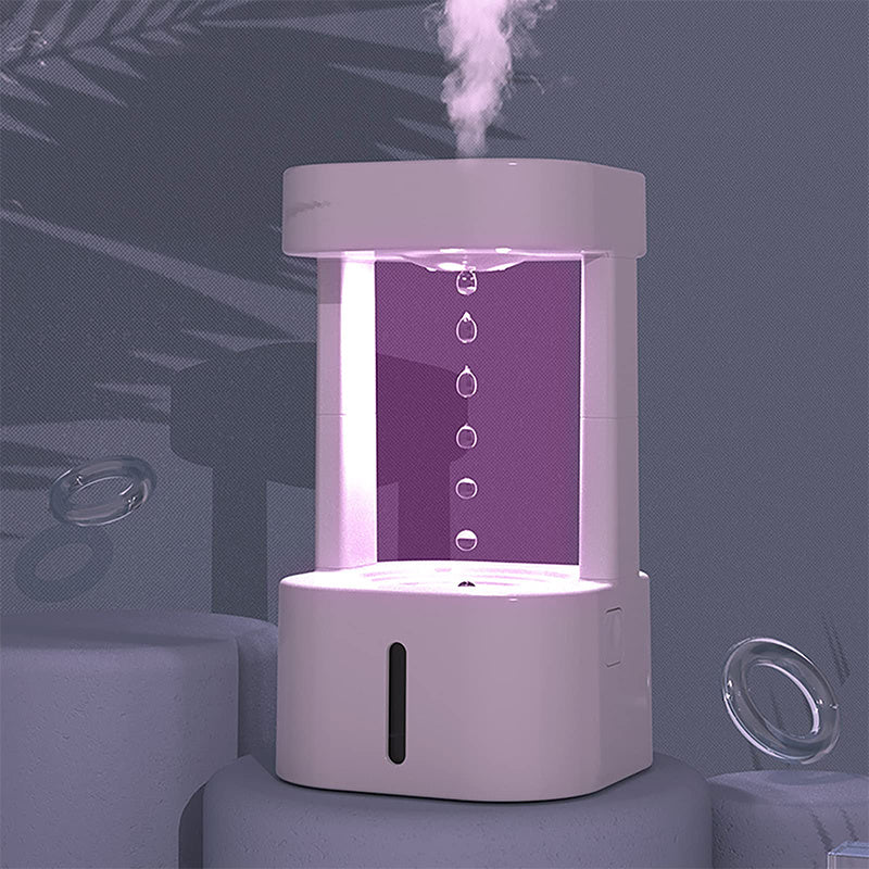 a white device with a purple light