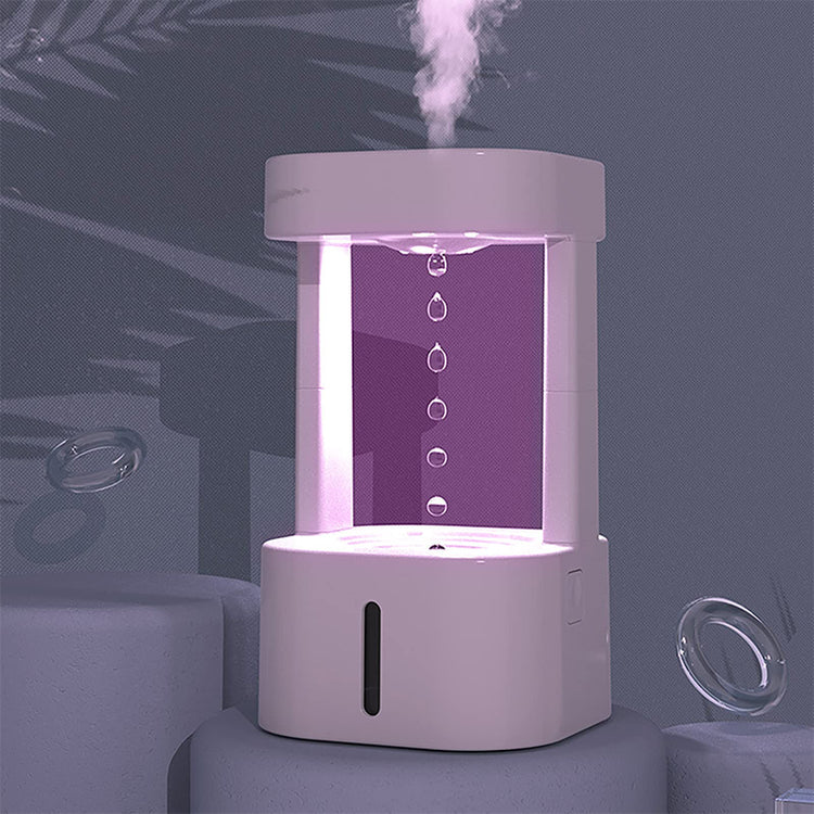 a white device with a purple light