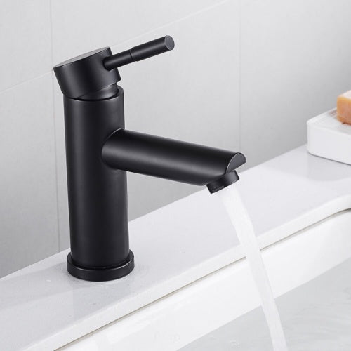 a black faucet with water running out of it