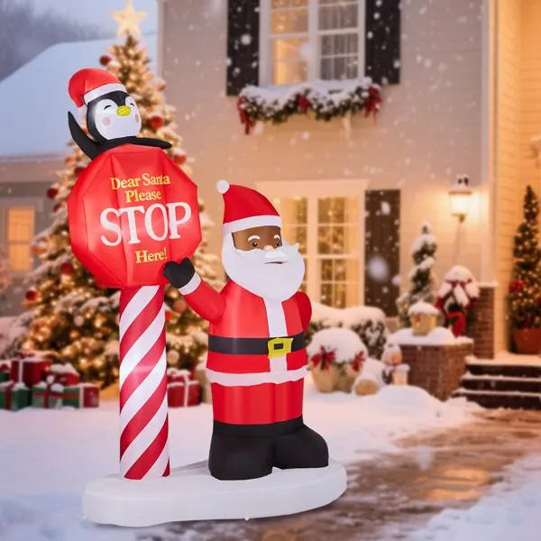 a christmas decoration in front of a house