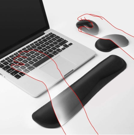 a laptop with a mouse pad and mouse pad