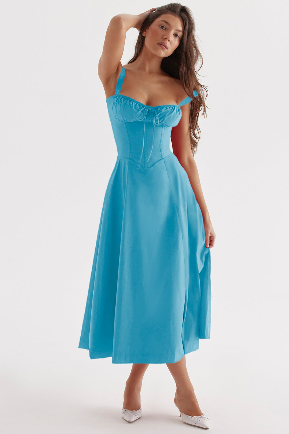 a woman in a blue dress
