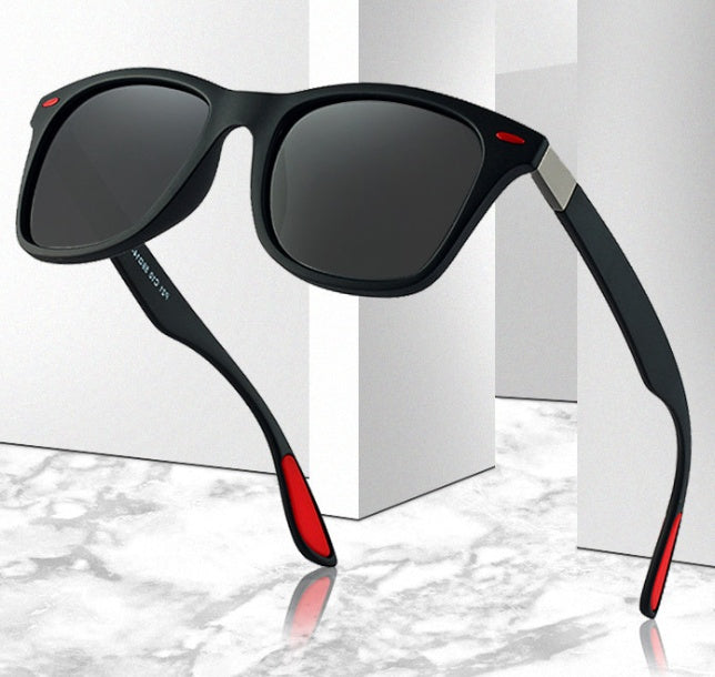 a pair of sunglasses on a marble surface