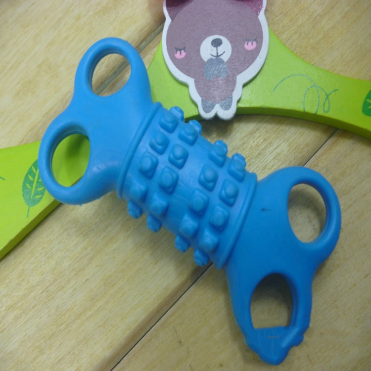 a blue toy on a wooden surface