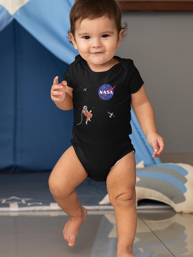 a baby standing in a room